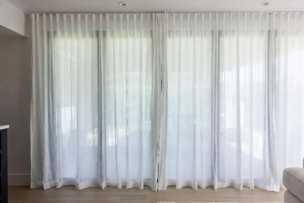 Add Floor-to-Ceiling Curtains