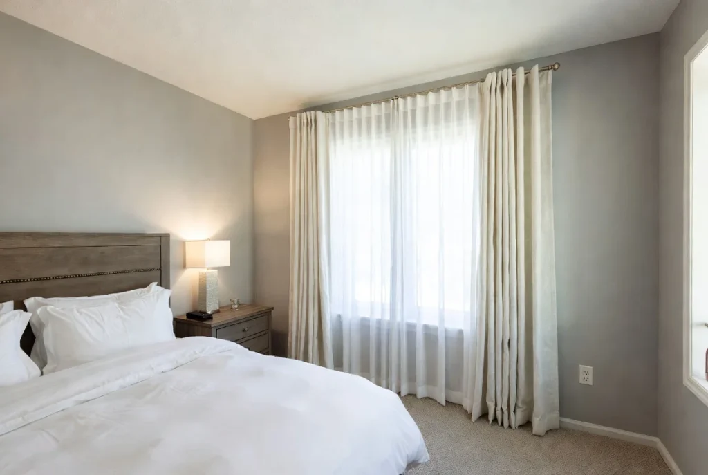 Add Floor-to-Ceiling Curtains
