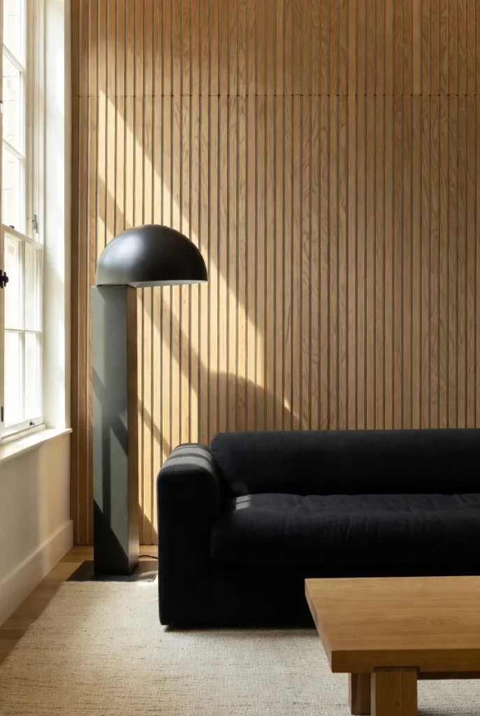 Black Sofa Paired With Wood: The Most Grounding and Natural Design Combination