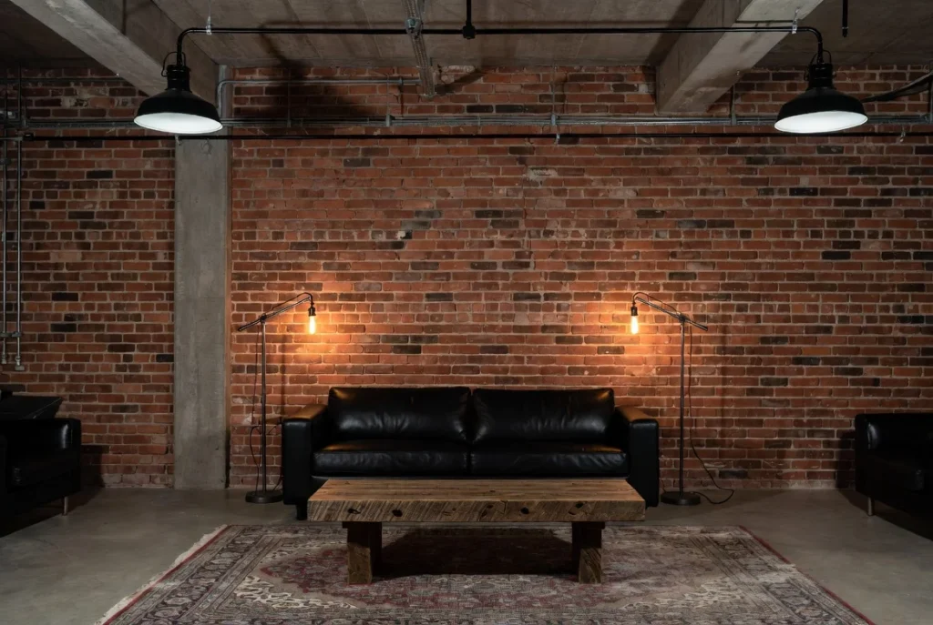 Industrial Style Living Room With a Black Sofa: Raw, Bold, and Unforgettable