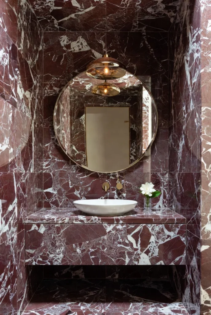 Red Marble Powder Room for Maximum Impact in Minimal Space