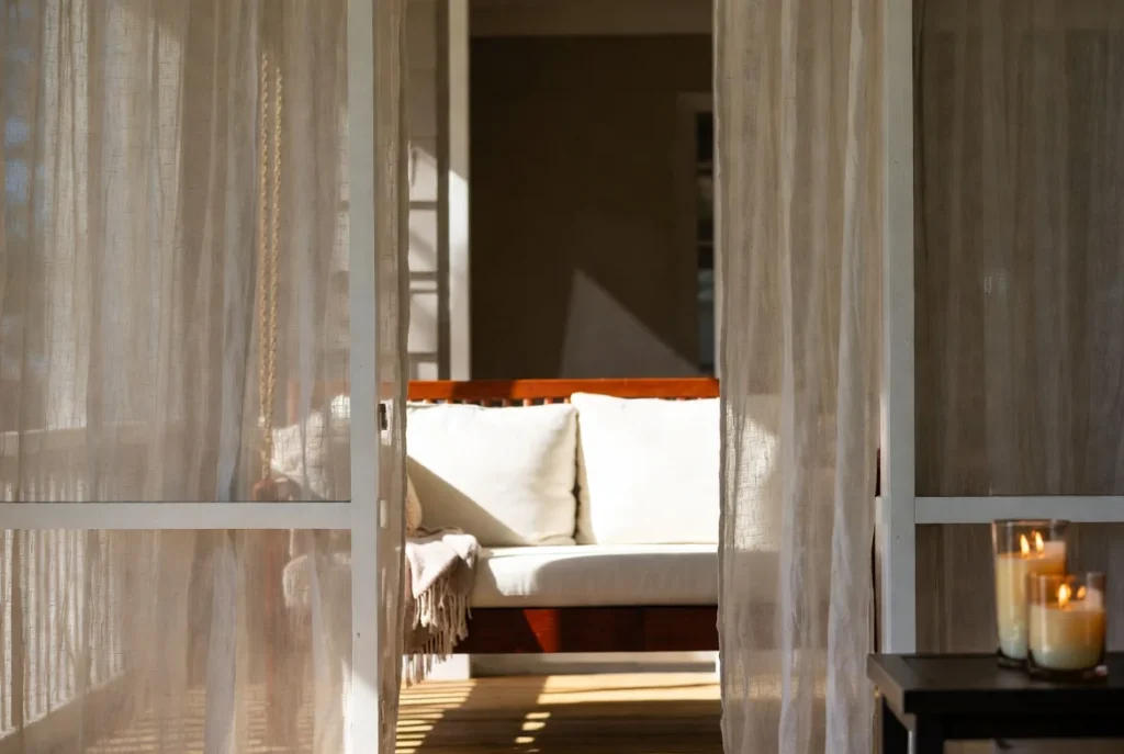 Screened Porch Swing with Curtain Privacy