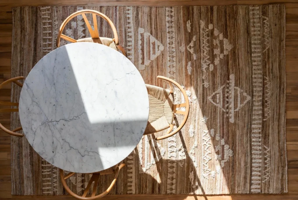Use Area Rugs to Define and Expand Your Dining Zone